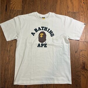 Bape White Graphic Tee with Black and Yellow Logo